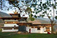 BHUTAN Chimi Lhakhang Temple is near Lobesa : built by Lama Drukpa Kunley (1455-1529) "The Divine Madman" childless women go to the temple to receive a blessing